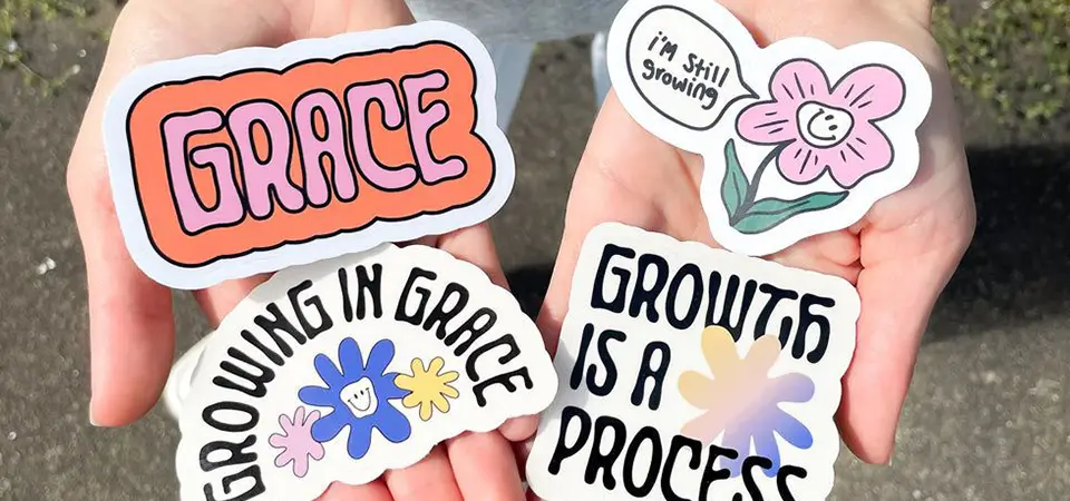 1960s Bumper Stickers A vintage 1960s peace sign bumper sticker on a classic car.