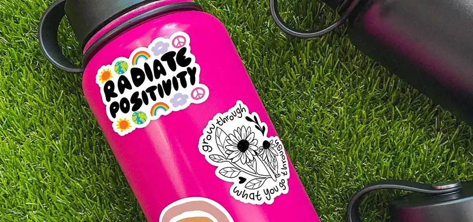 1990s Sticker Culture A 90s skateboard deck covered in stickers from skate brands like World Industries and punk bands.