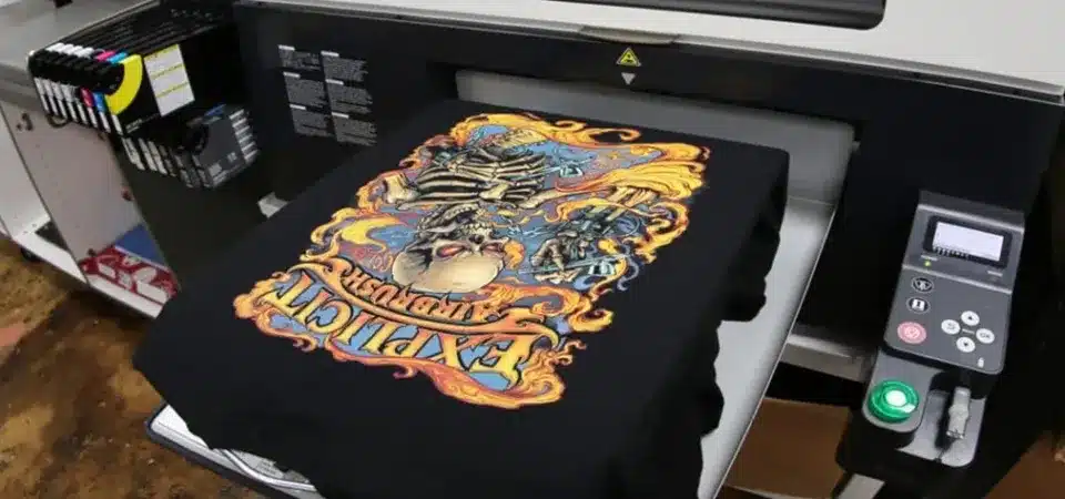 A side-by-side visual comparison of a design printed with DTF, Screen Print, and DTG