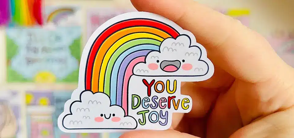 A close-up shot showing the color vibrancy on a glossy sticker versus the soft look on a matte sticker.