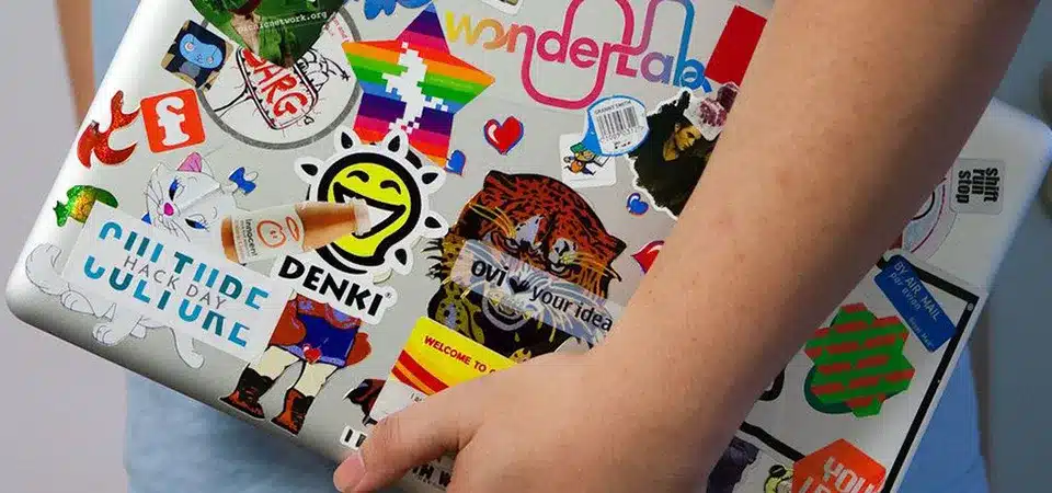 how to remove stickers from laptop