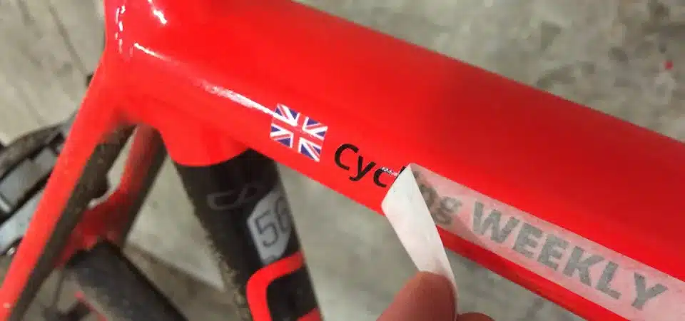 Close-up of a durable vinyl bike sticker with a matte finish