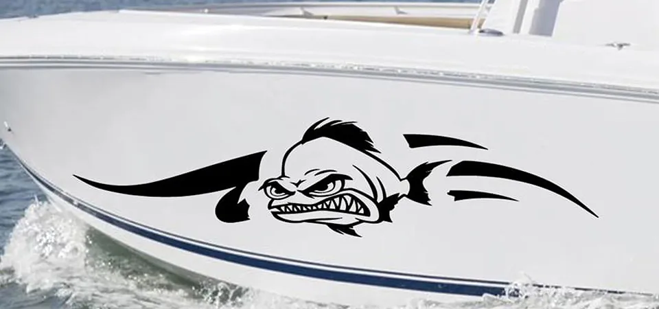 A person sketching ideas for a boat name, a fishing logo, and registration numbers.