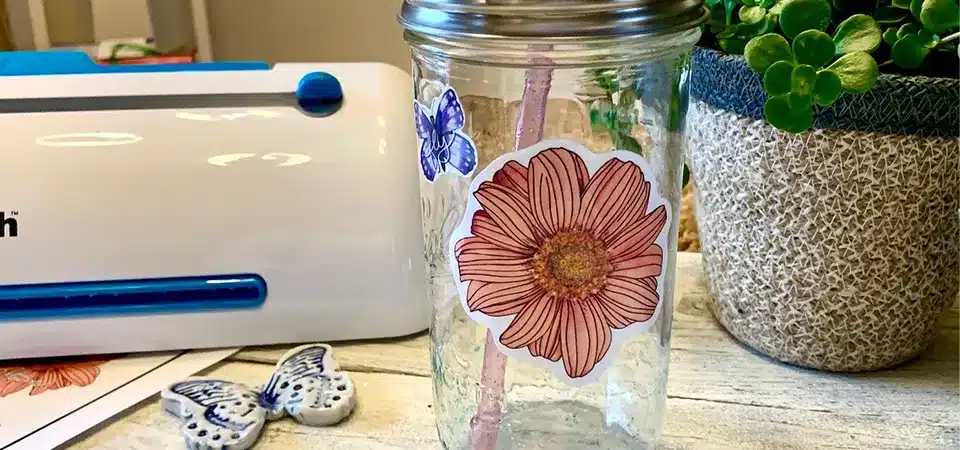 A sticker on a water bottle being washed in a sink
