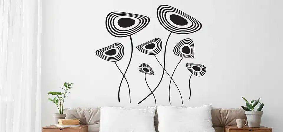 A vibrant wall decal in a living room that still looks new after several years