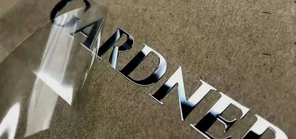 A company logo as a transfer sticker on a glass office door