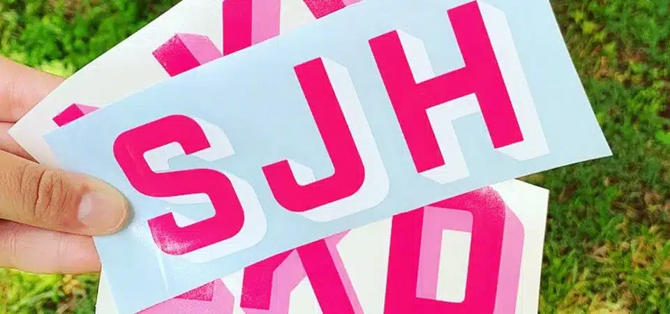 A close-up diagram showing the durable layers of a vinyl sticker