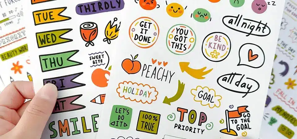 A set of four sticker sheets, one for each season: spring, summer, fall, and winter