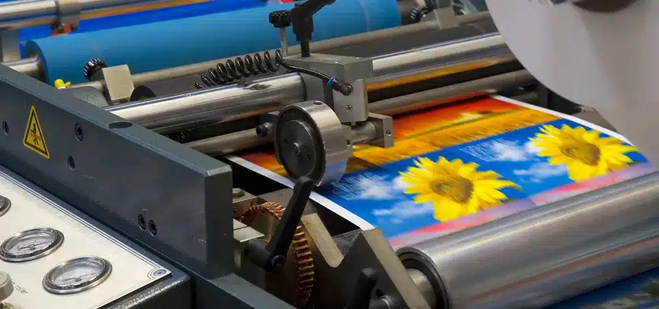 A flowchart showing the steps: Pre-Press -> Plate Making -> Printing -> Finishing -> Delivery