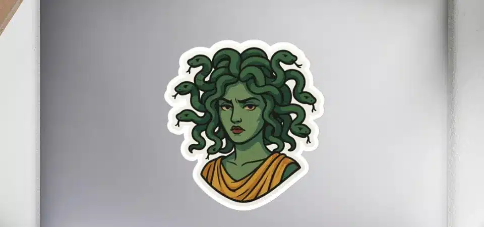 A lab machine performing a peel test on a sticker sample