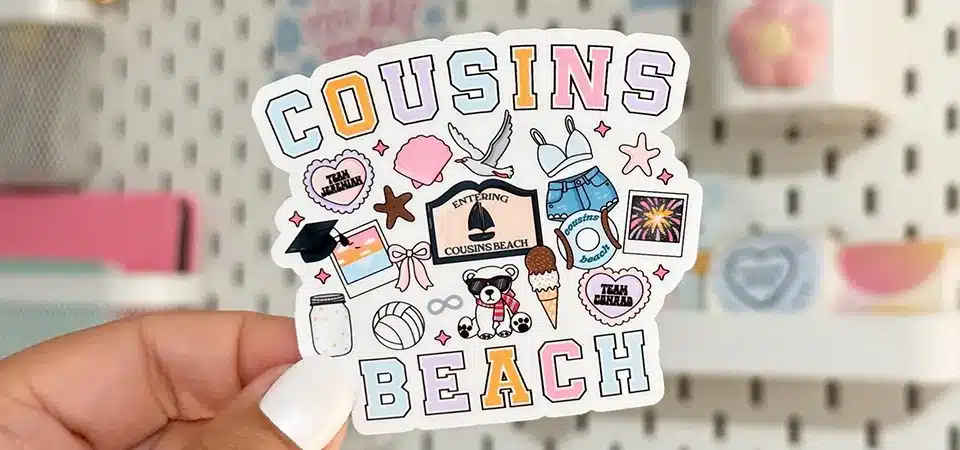 Custom Die Cut Dragon Sticker An intricate die cut sticker shaped like a dragon, held in a hand