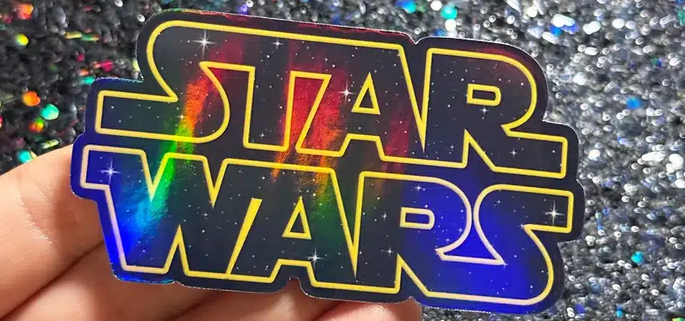 Printing on Holographic Vinyl A close-up photo showing the difference between a printed area and an unprinted area on holographic vinyl