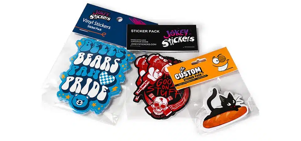 A photo gallery showcasing themed sticker packs like 'Summer Vibes' and 'Planetary Pack'