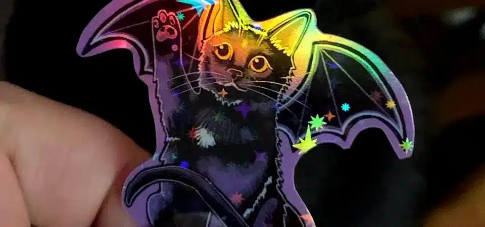 The Manufacturing Process of Holographic Vinyl An animated graphic showing a roller embossing a pattern onto a metalized film