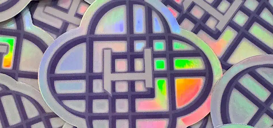 A geometric holographic sticker for Brewbilt Brewing