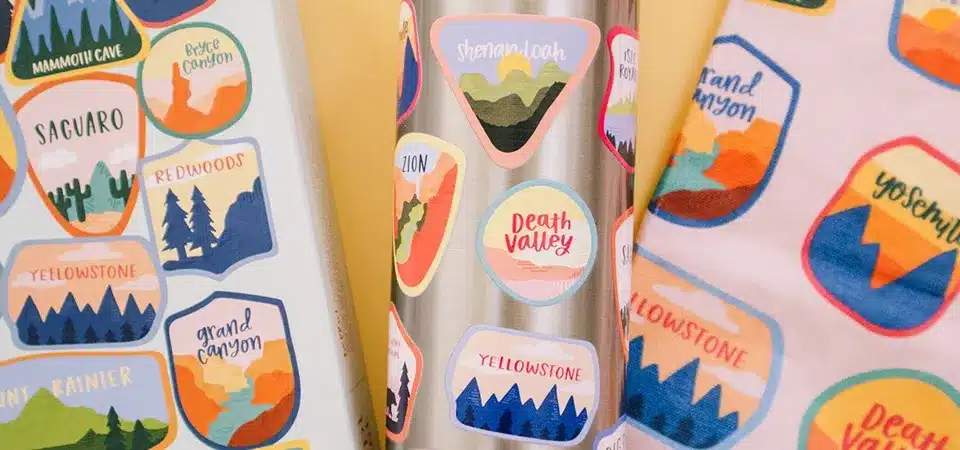 A side-by-side comparison of a pristine laminated sticker next to a scratched and faded unlaminated sticker