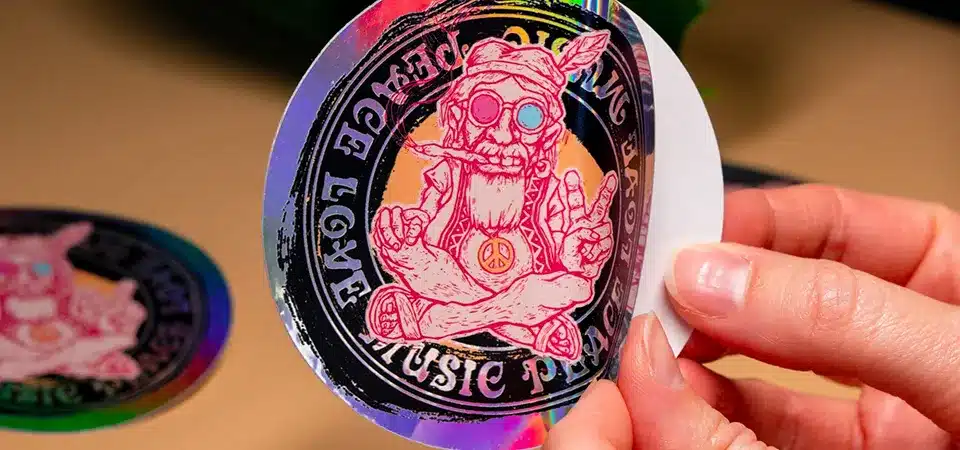 A minimalist holographic sticker design that uses a lot of negative space to highlight the holo effect