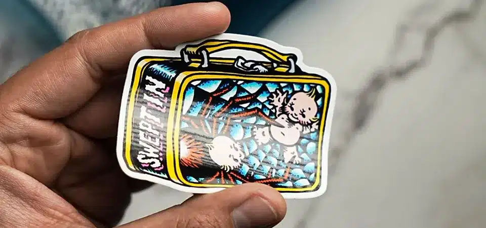 Using a hair dryer to heat a sticker on a surface