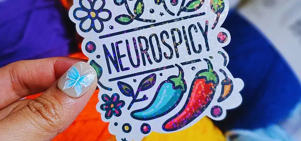 Matte vs Glossy vs Vinyl Three types of sticker paper: matte, glossy, and clear vinyl side by side