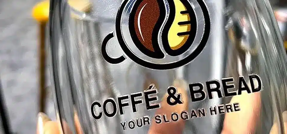 A measuring tape and masking tape marking the center of a surface for sticker placement