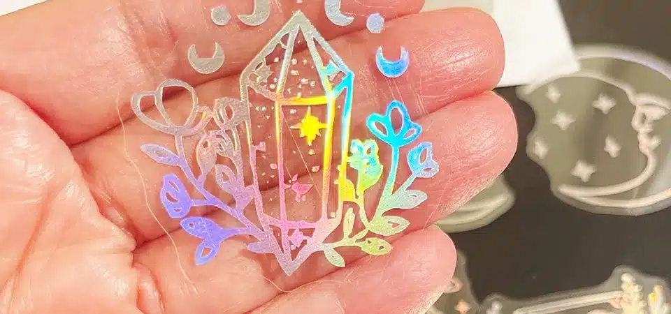 A holographic sticker with a brain illustration for a brand called Kreative Memories