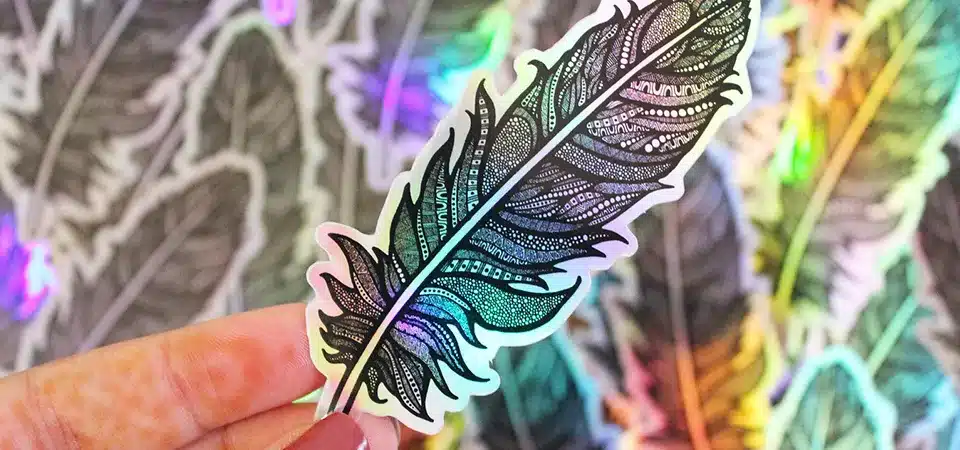 A detailed holographic sticker of a flamboyant feather for a THC brand