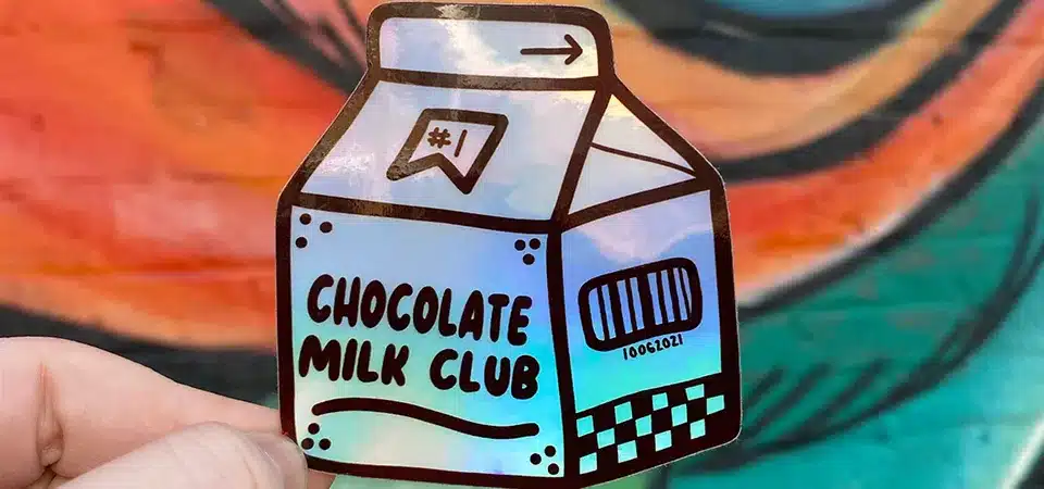 A psychedelic holographic sticker for a brand called Milk and Cookies
