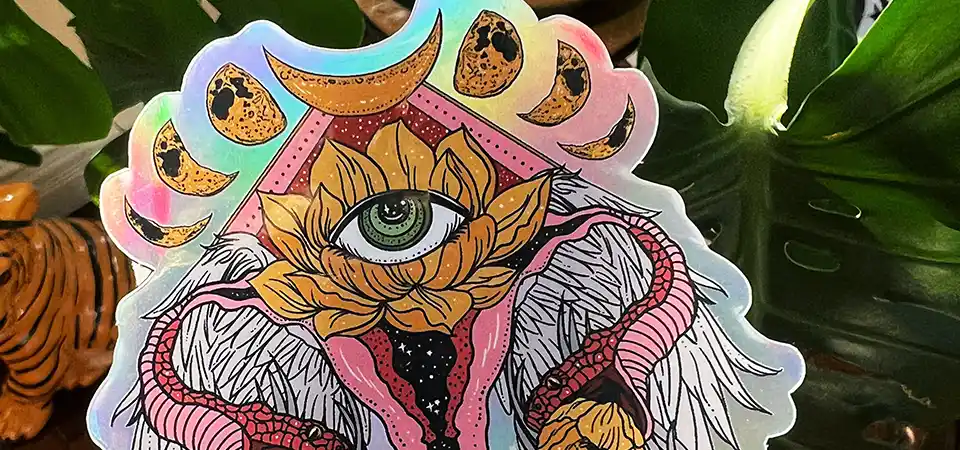 An elegant and eerie holographic sticker for a brand called Nectarmancer