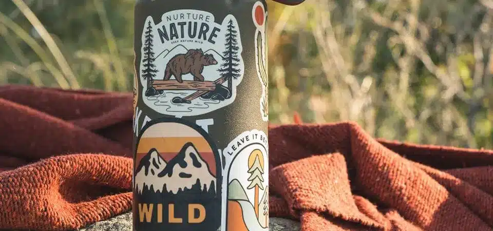 A collection of various high-quality vinyl stickers showing different shapes and finishes