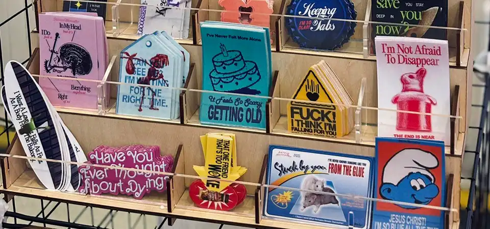 Photo storage box with multi-colored cases for loose stickers