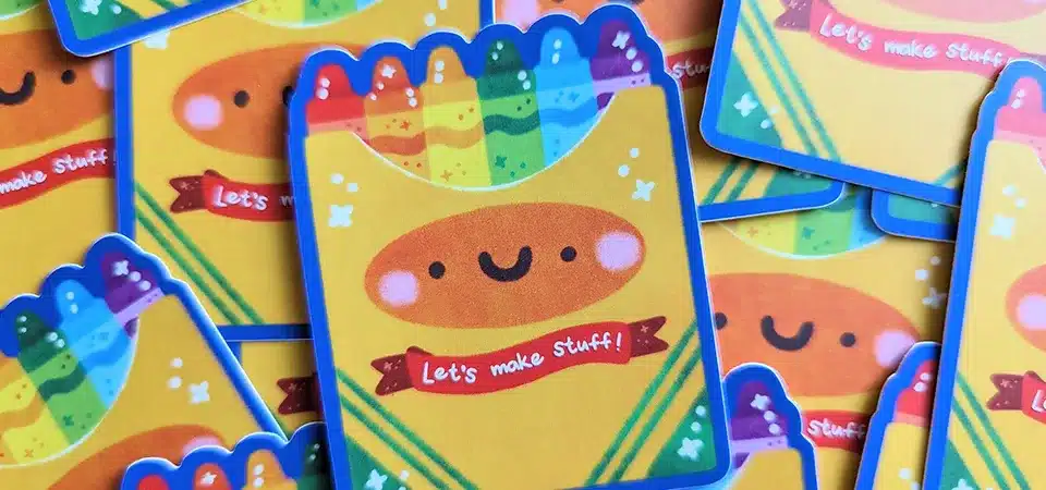 Professional vs Home Printing A stack of professional UV printed stickers showing water resistance