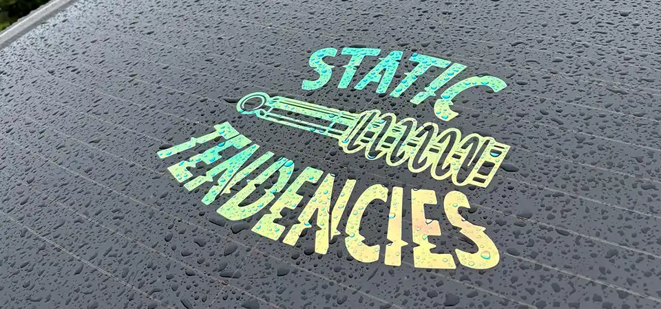 Comparison of different sticker sizes on a car rear window