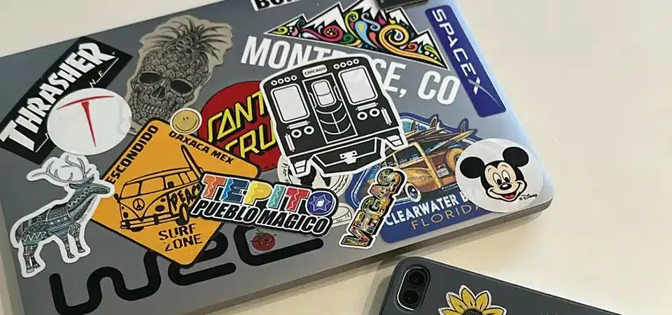 A well-arranged laptop lid with a cohesive color theme