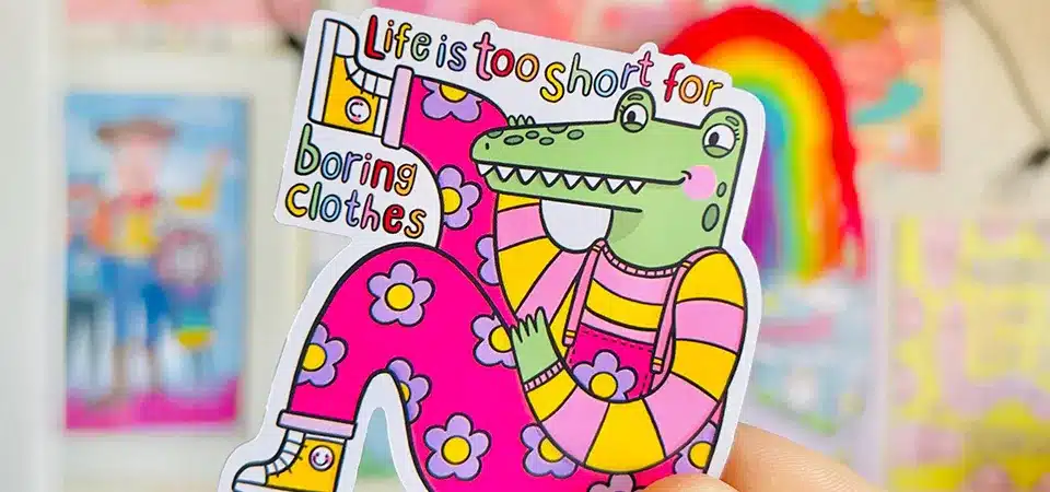 Creating Vector Cutline Computer screen showing a vector path being drawn around a photo subject