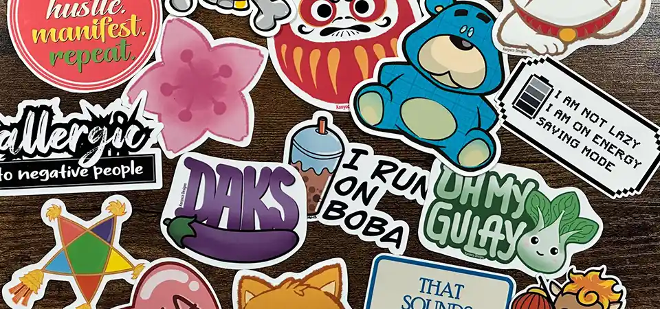 PNG Transparency vs. JPEG Background A sticker design as a PNG with a transparent background next to the same design as a JPEG with a white box around it