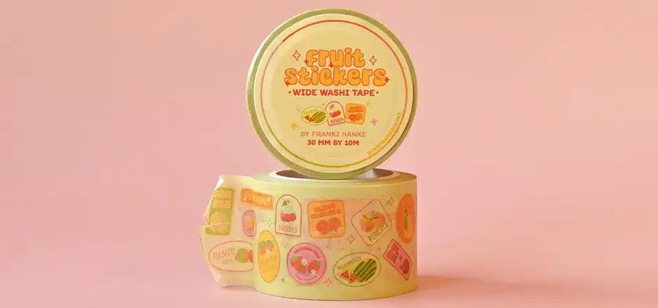 Comparison of Sticker Sheets and Rolls An infographic diagram comparing sticker sheets (hand application, retail) versus sticker rolls (machine application, production)