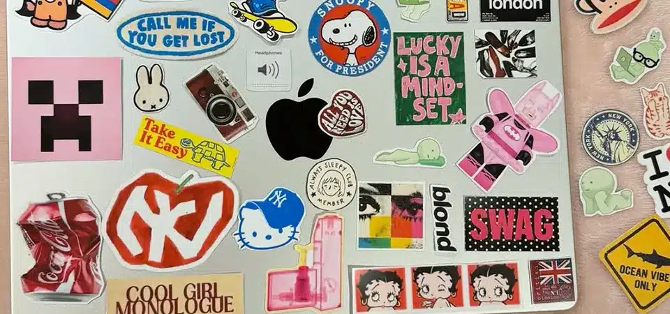 A hand holding a high-quality matte sticker, emphasizing its physical texture