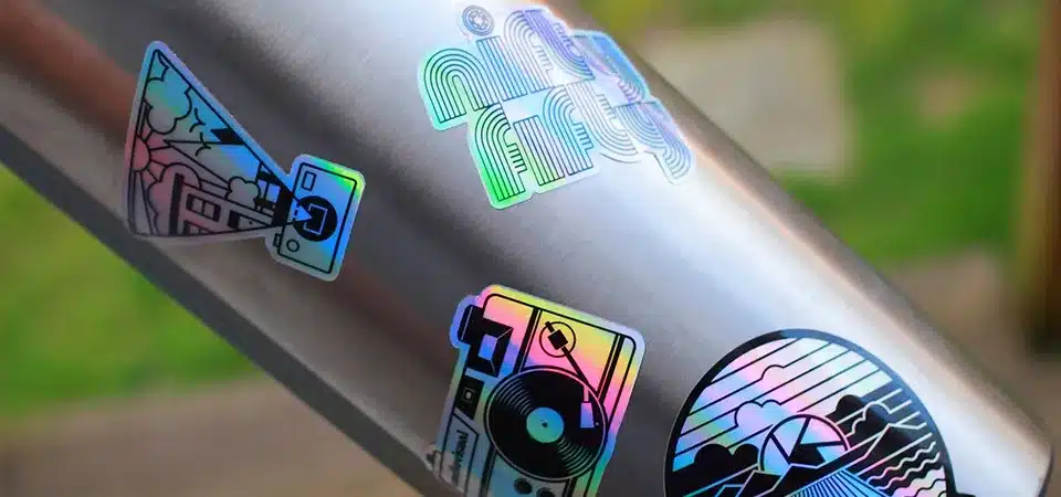 A close-up shot of a durable, waterproof sticker on a beverage bottle covered in condensation