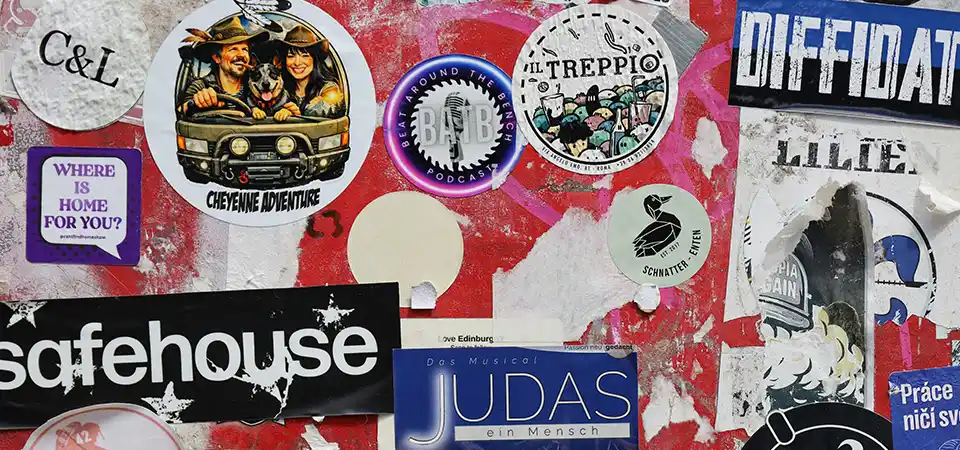 A crowd of people gathered around a surprising street art installation